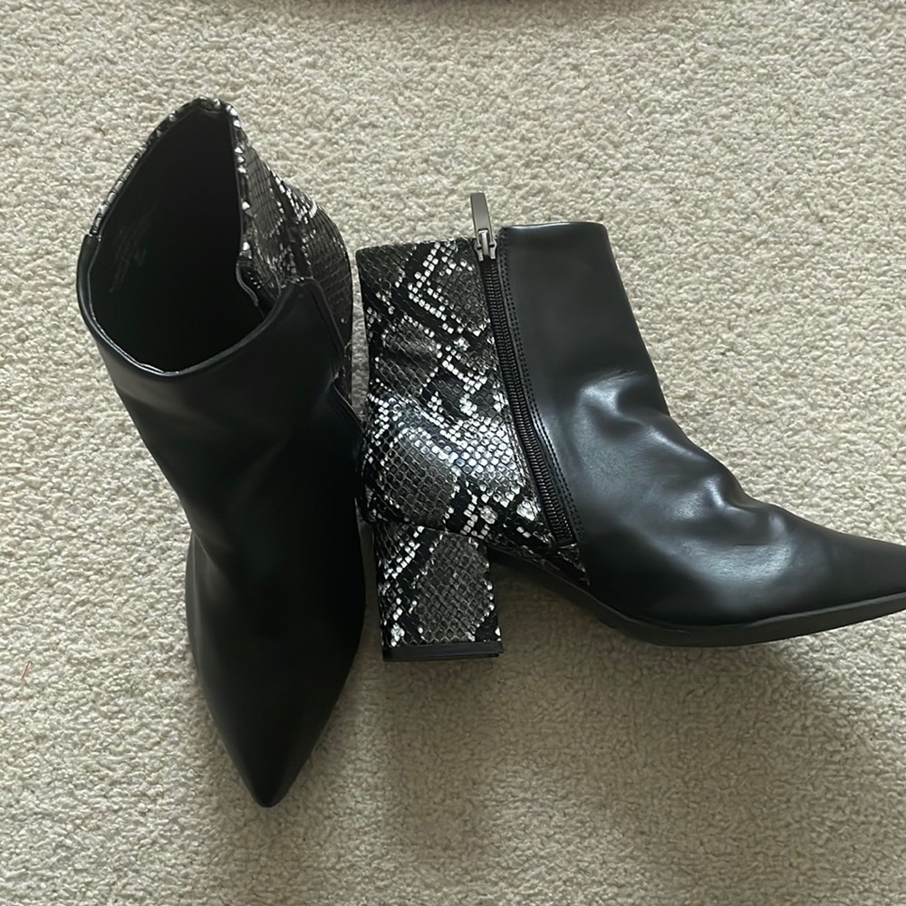 Black pointed snakeskin booties